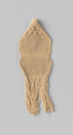 Fragment of woven cotton; at one end the threads are knotted into tassels