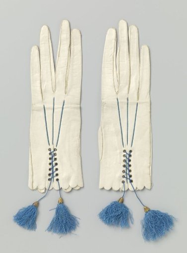 Pair of gloves with tassels