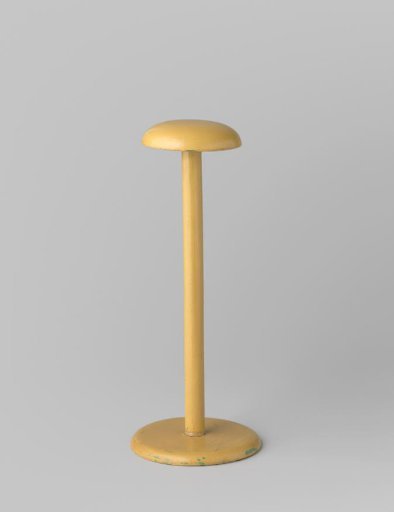 Hat stand of yellow painted wood