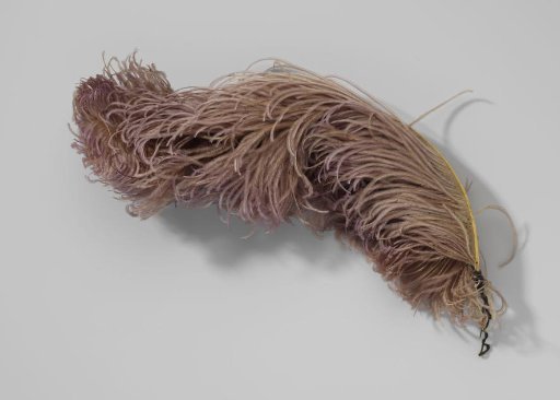 Tuft of ostrich feathers in mottled yellow and grey
