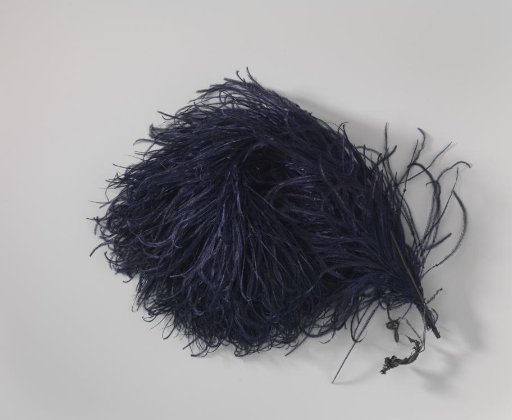 Tuft of ostrich feathers, dark blue, with strongly curved tip