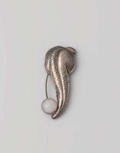 Silver clip, 'Arum' with faceted milky chalcedony