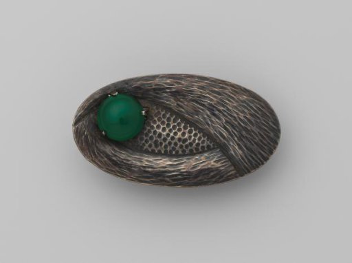 Brooch of silver with green paste