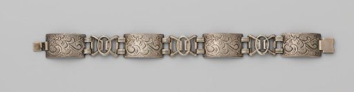 Silver bracelet with four engraved links