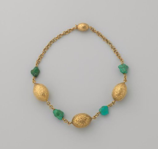 Necklace of gold with three gold walnuts and hammered rough turquoise