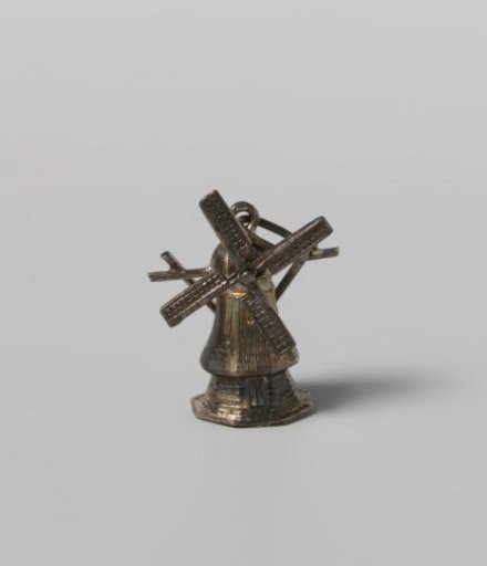 Silver charm of a mill