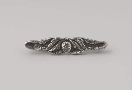 Silver hair clip with floral relief