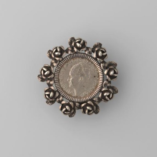Quarter from 1928 with portrait of Wilhelmina in a rose border