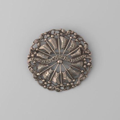 Round silver brooch 'Forever flying for freedom'
