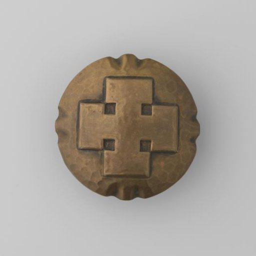 Round brooch of base metal with a Burgundian cross in relief