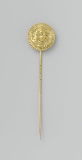Reverse pin with a child's head struck from a German coin