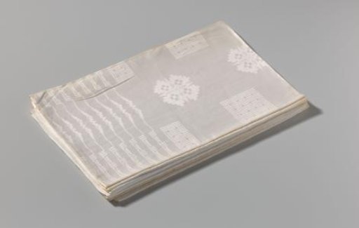 Tablecloth with geometric interlaced blocks and pelican motif (stylized flowers) with crown hole mark