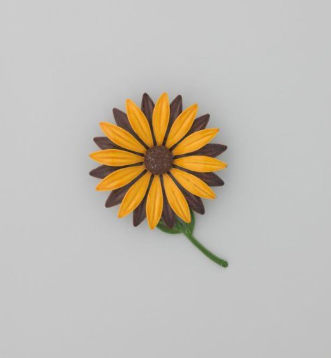 Brooch in the shape of a flower in yellow, brown and green enameled metal