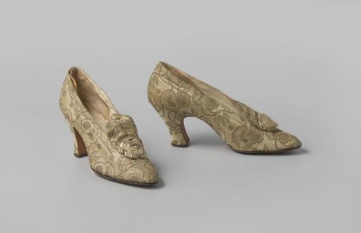Lady's shoe (evening shoe) of cream-colored silk brocade (left)