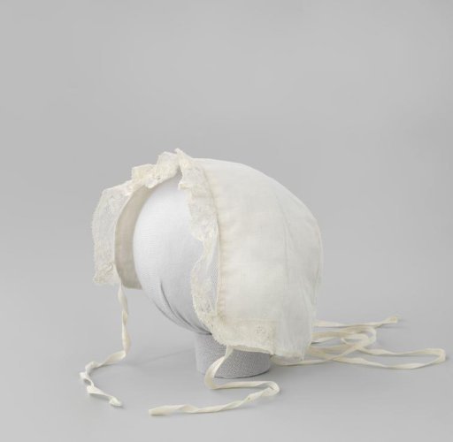White Baby Cap with Ribbons and a Strip of Lace