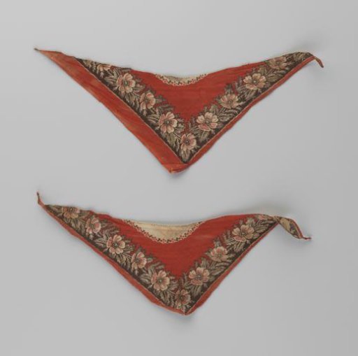 Triangular fragment of red fabric