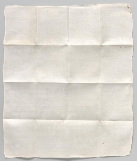 White damask napkin with floral pattern