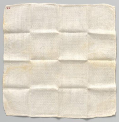 White napkin with woven check pattern