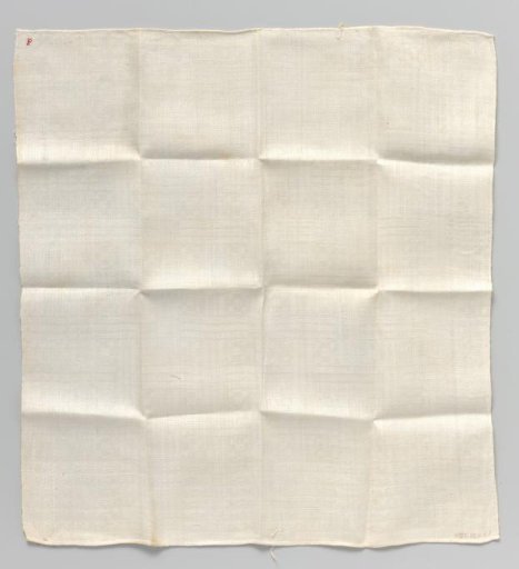 White damask napkin with geometric pattern