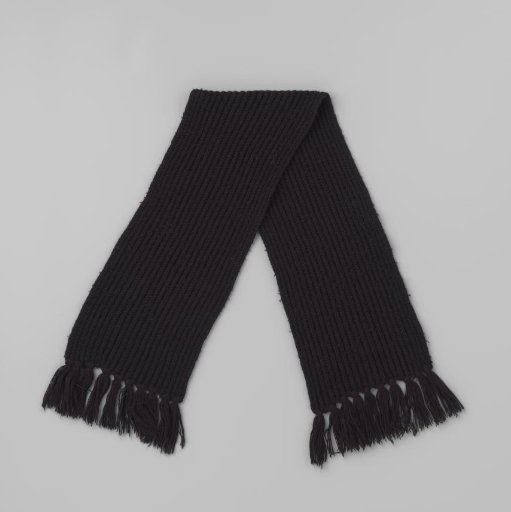 Black knitted scarf with tassels at the ends