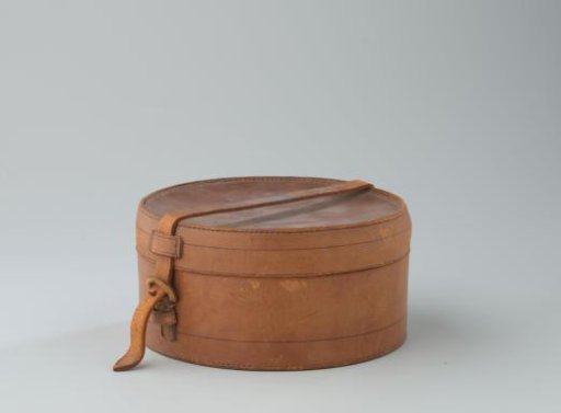 Round trunk of brown leather