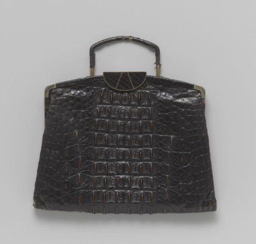 Shoulder bag of dark brown reptile leather