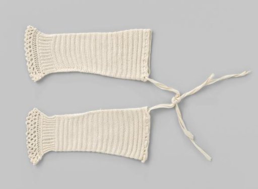 Knitted white baby sleeve