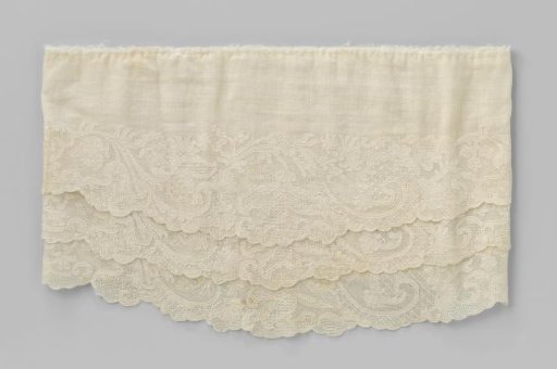 White sleeve with three layers of white cutwork lace