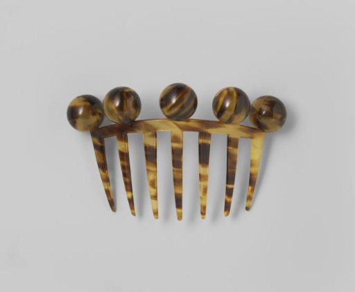Hair comb made of imitation tortoiseshell (celluloid)