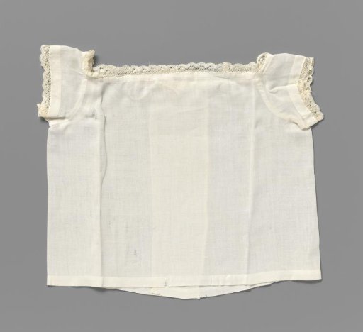 Baby dress of white linen batiste trimmed with strips of Valenciennes lace