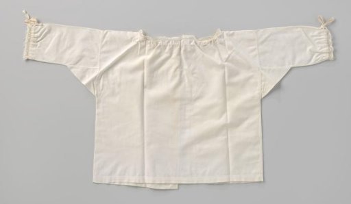 White baby jacket trimmed with strips of Valenciennes lace