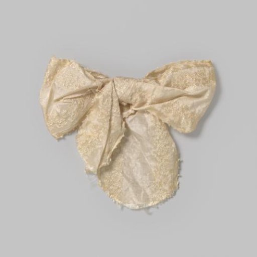 White bow with embroidery