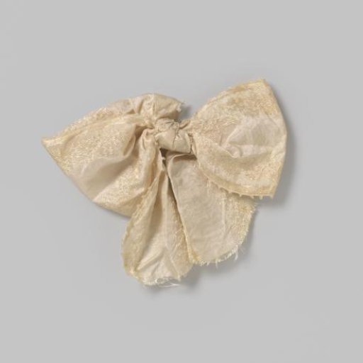 White bow with embroidery