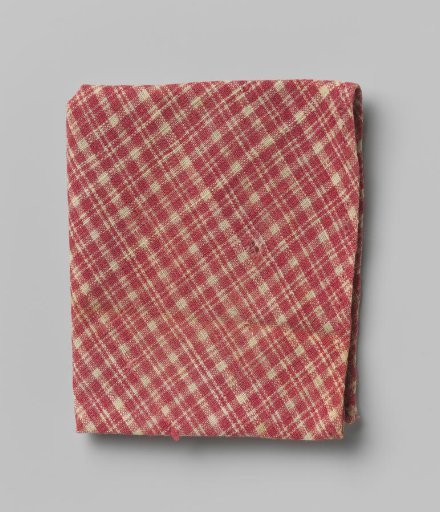 Triangular cloth of woven textile with block pattern in red and white