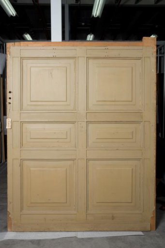 Panelling, Part: Frieze with openwork vines with dragons. Projecting part with two doors with cushion panels
