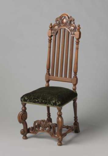 Walnut chair with upholstery of green floral-patterned leather. Back with five parallel stiles. Construction and decoration including S-scrolls