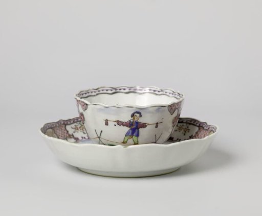 Cup and saucer with three Chinese acrobats and landscapes in panels