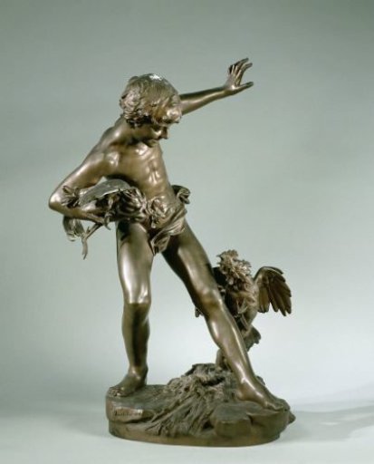 Boy with two fighting roosters