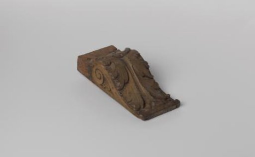 Console with carved ornament