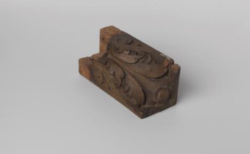 Console with carved ornament
