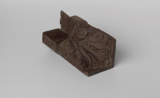 Console with carved ornament