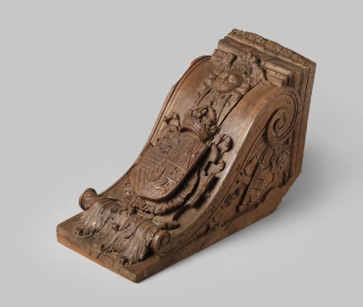 Cartouche with the coat of arms of the King of Spain, hanging from a mask
