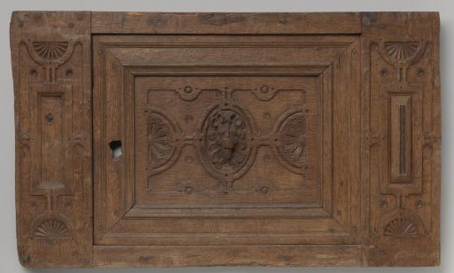 Wall cabinet, the door decorated with embossed lion heads