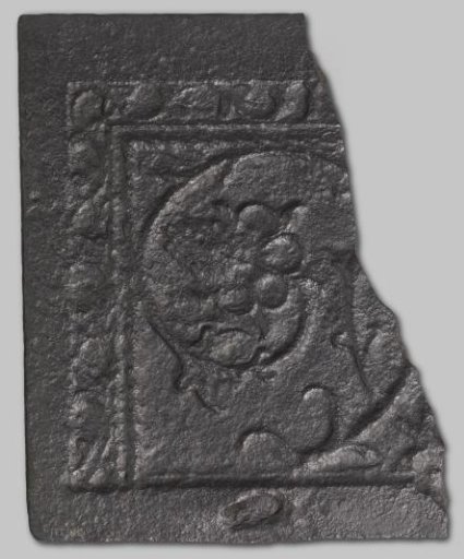 Hearth plate with a pomegranate flower