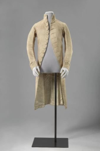 Coat with dotted pattern
