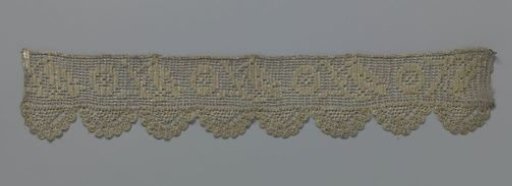 Strip of crocheted lace of gold thread with a bird on a branch
