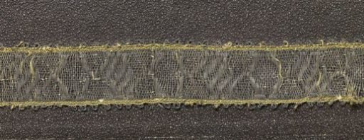 Passementerie of gold and silver thread with red silk