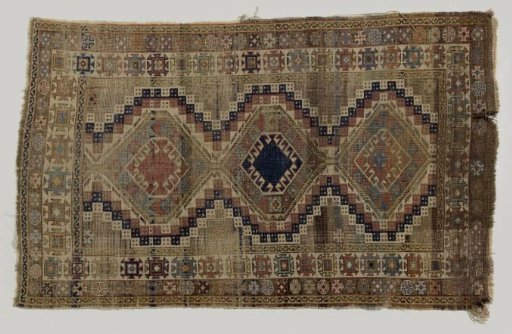 Woolen carpet with geometric figures