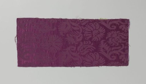 Fragment of purple silk damask