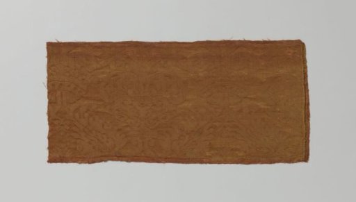 Fragment of red silk damask